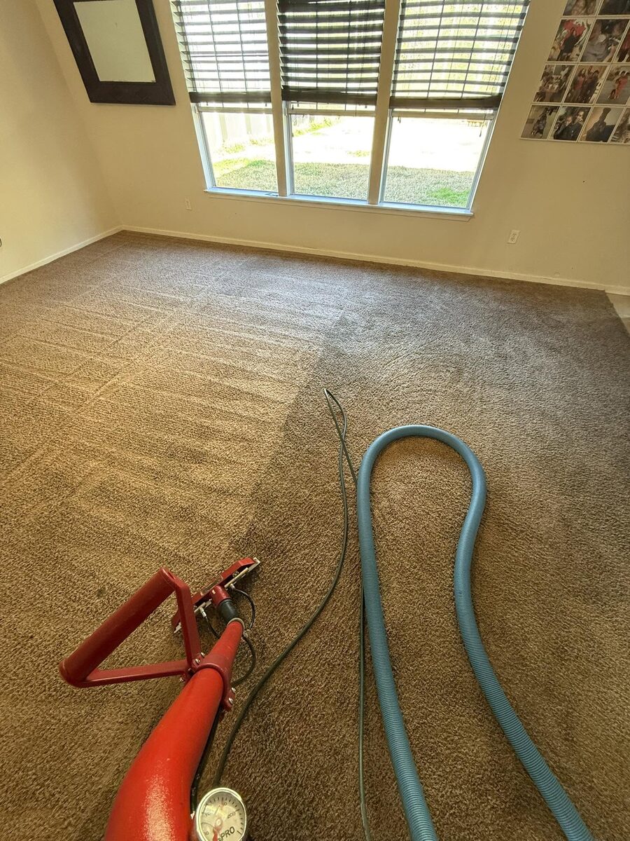 Carpet cleaning in progress with professional equipment, from a Duval Floor Care Facebook job photo